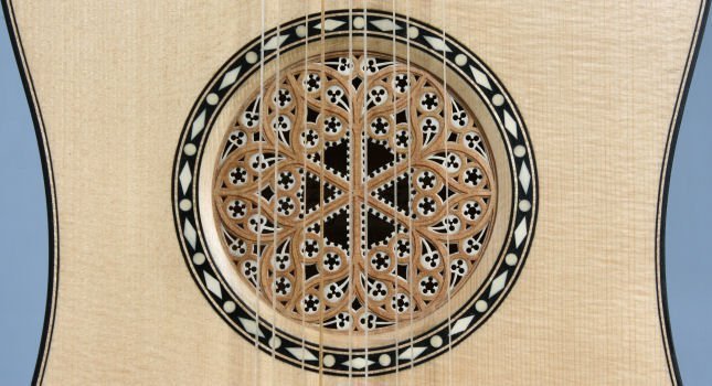 Stradivari guitar rose with surrounding inlay